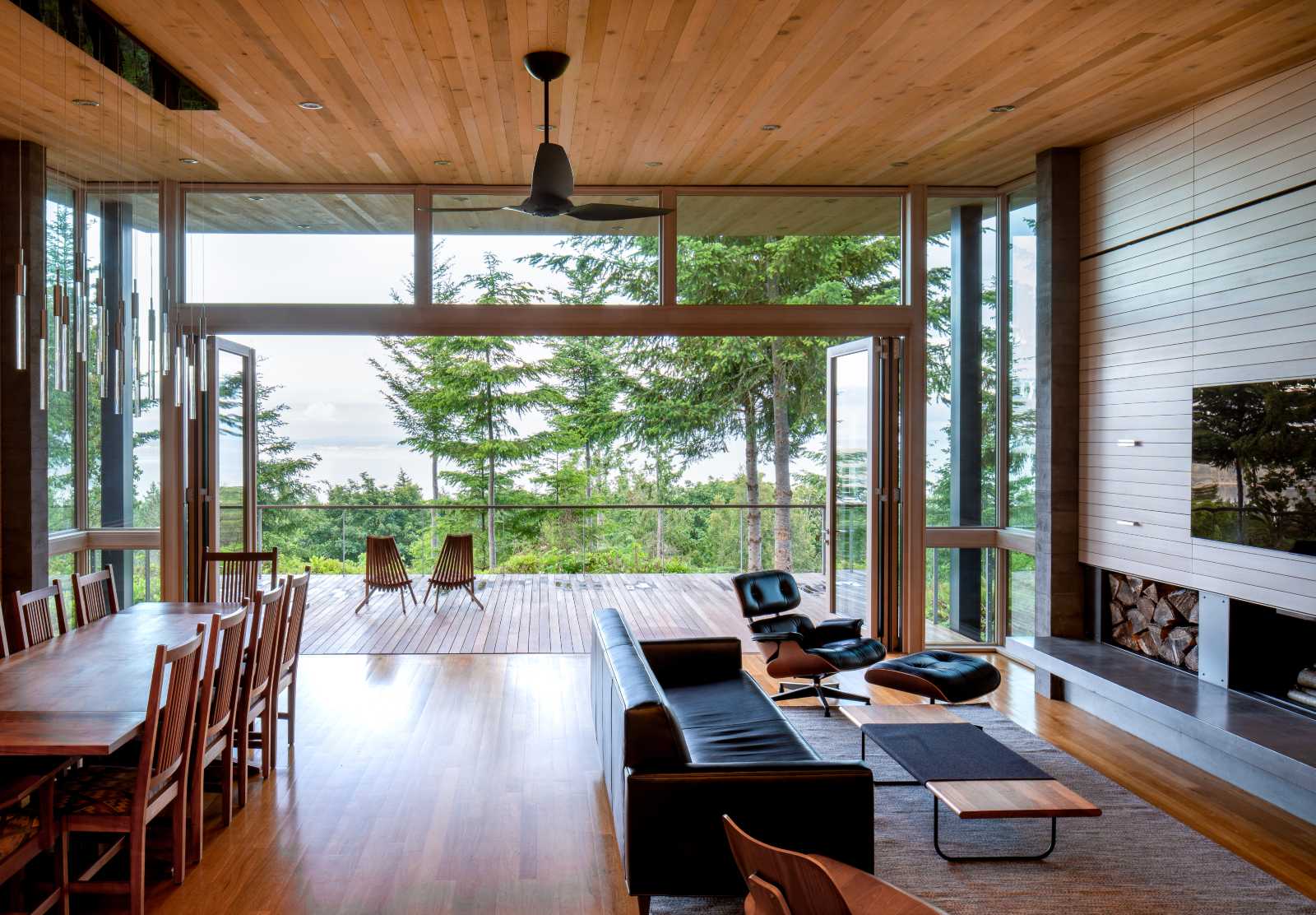 Living room with large glass doors leading onto the deck